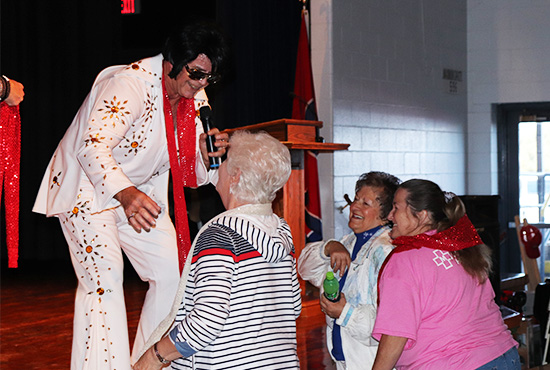 Crowd watching Elvis impersonation performace