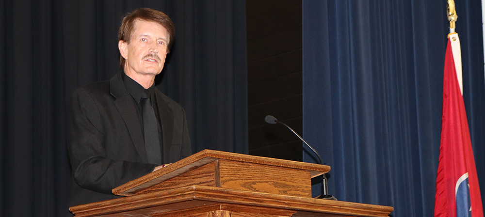 Johnny McClanahan giving a speach at the annual member meeting